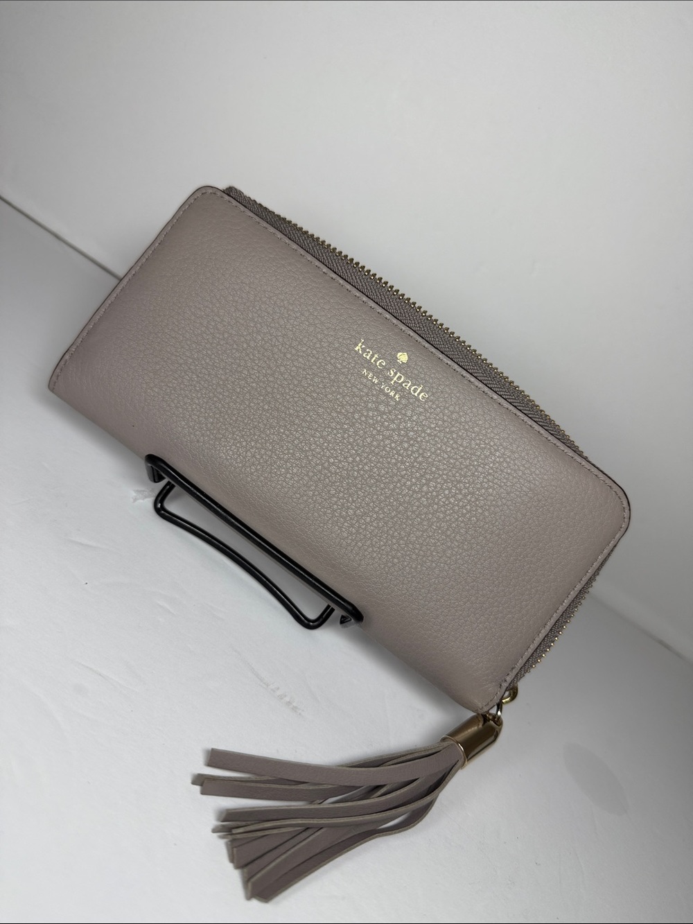 Kate Spade New York Pebbled Leather Zip-Around Wallet with Tassel - Taupe/Grey
